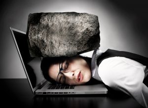 Woman with laptop having stress.